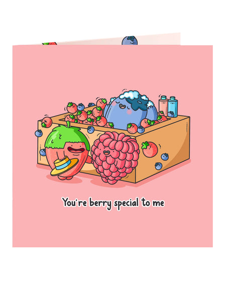 Front of the "You're berry special to me" greeting card by Toastedink, stocked at Rebel Romance. Shows cute cartoon strawberry, raspberry and blueberry in a fruit pun design perfect for alternative gift-givers.