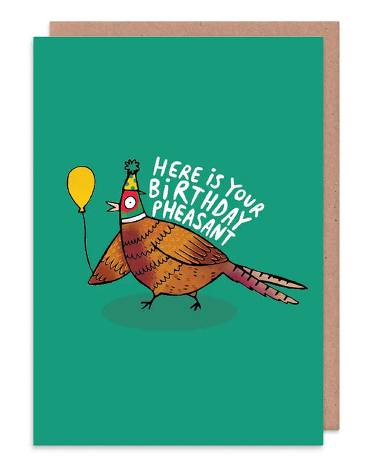 Fun happy birthday card featuring pheasant design holding a yellow balloon on a teal background. Designed by Katie Abey in the UK. Available on Rebel Romance
