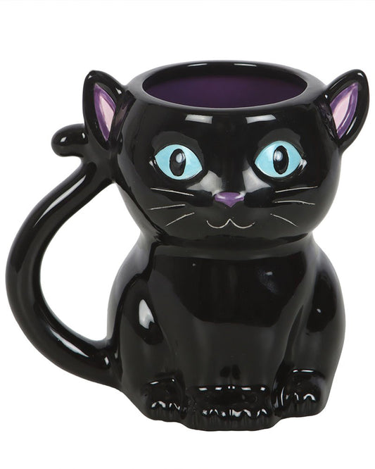 Front-facing view of the Rebel Romance Cute and Creepy Black Cat Mug showing its wide blue eyes, purple nose and ears, and curled tail handle. A ceramic mug with gothic charm and whimsical details that’s ideal for Halloween or spooky year-round vibes.