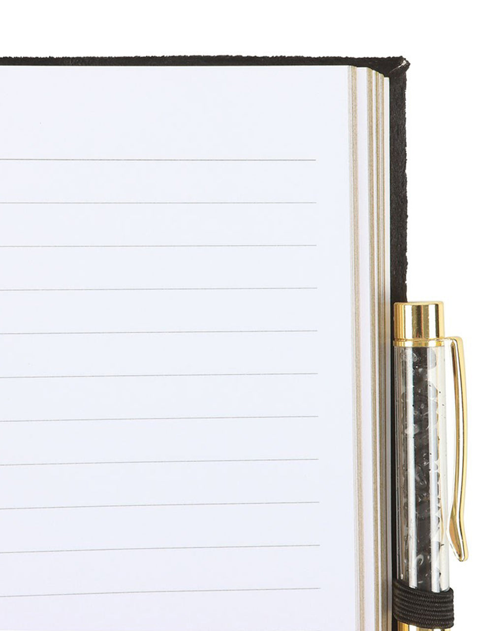 Inside view of the Book of Shadows journal, showing lined white pages with gold-edged sides. A black elastic pen holder secures the matching black obsidian crystal pen with gold accents.
