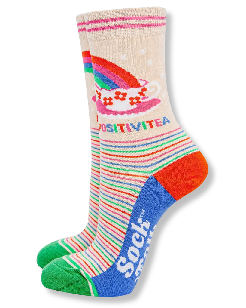 Colorful socks with rainbow design and text on a white background