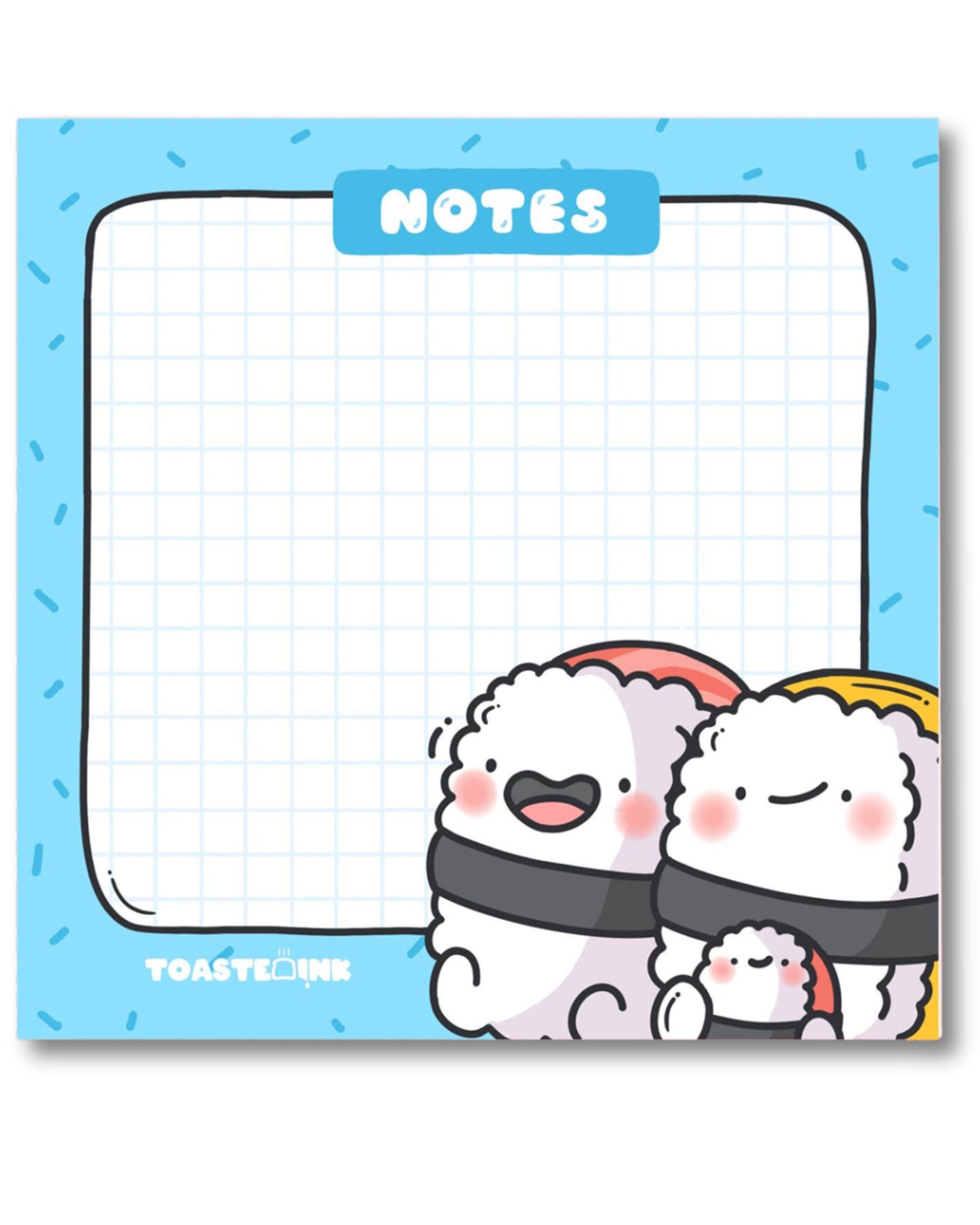 Toastedink Sushi Sticky Notes styled on a pink surface, featuring happy sushi characters at the bottom and a grid for writing. Stocked by Rebel Romance, a UK brand for quirky stationery.