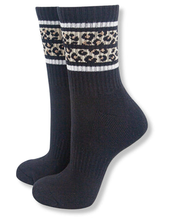 Pair of dark blue socks with a patterned cuff on a white background