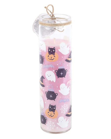 The Pastel Halloween Candy Apple Tube Candle stands tall in a clear glass holder. It has a vibrant pink wax centre and a jute twine bow around the top, adding a rustic touch. The design features smiling ghosts, bubbling cauldrons, and pumpkins for a fun Halloween vibe.