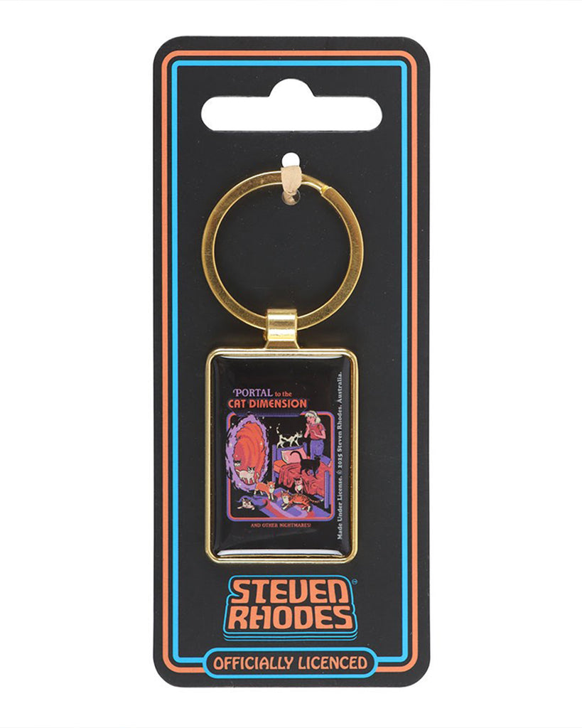 Rebel Romance enamel keyring featuring Steven Rhodes’ ‘Cat Dimension’ design on backing card. The rectangular gold-framed accessory displays cats spilling from a portal in retro horror style. Officially licensed quirky gift, perfect for cat lovers and fans of gothic and alternative aesthetics.
