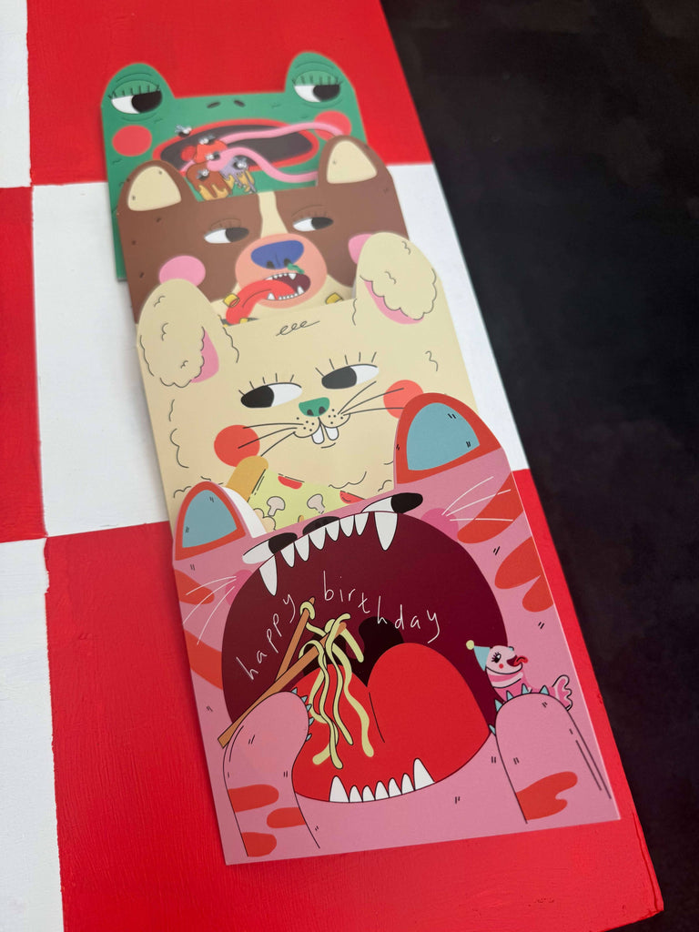 Colorful birthday card with cartoon characters on a red background