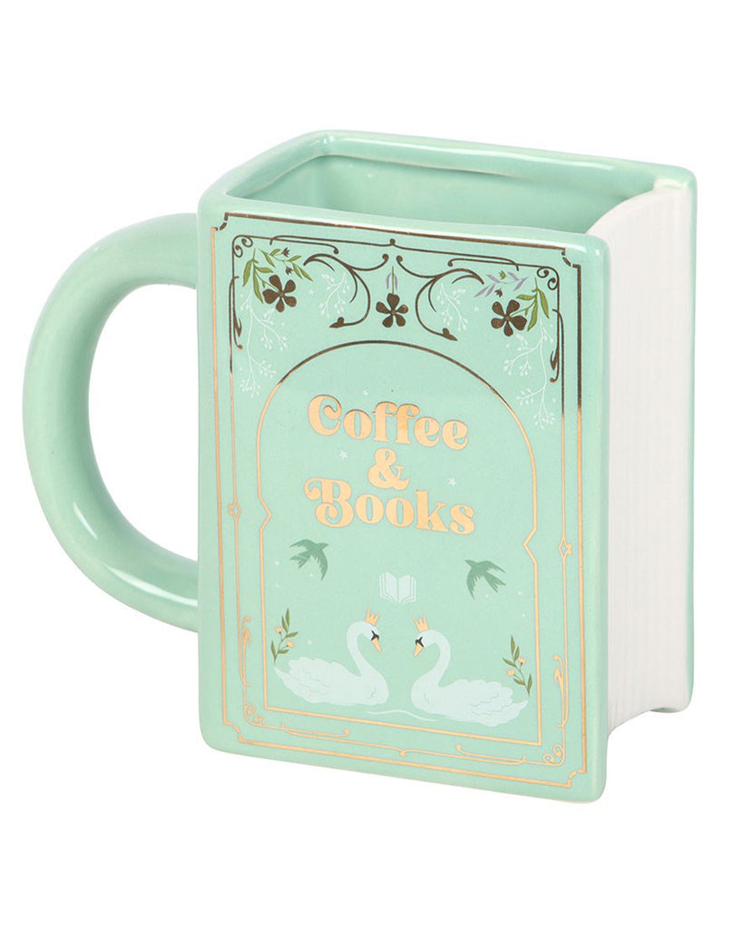 Side view of Rebel Romance’s Coffee and Books green book-shaped mug. A ceramic design with swans, floral details and gold lettering. The ideal quirky gift for bookworms who enjoy cosy reading moments with hot drinks.
