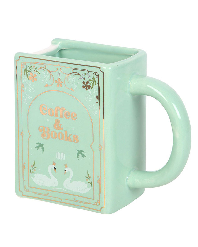 Rebel Romance Coffee and Books green ceramic mug shaped like a vintage book. Featuring gold details, swan illustrations and the phrase Coffee & Books. A whimsical homeware gift for bookworms and millennials who love reading with a brew.