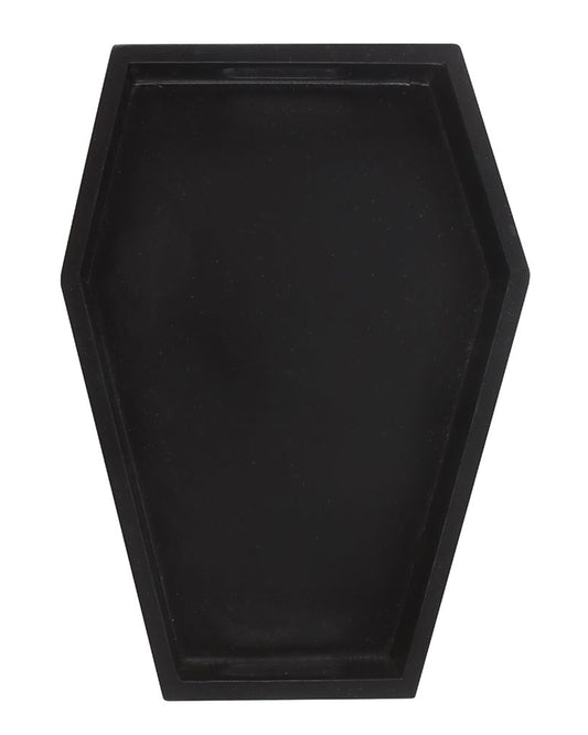 Top-down view of a coffin-shaped black trinket tray from Rebel Romance. Minimalist gothic design ideal for alternative interiors, used to hold jewellery, drinks, or candles.