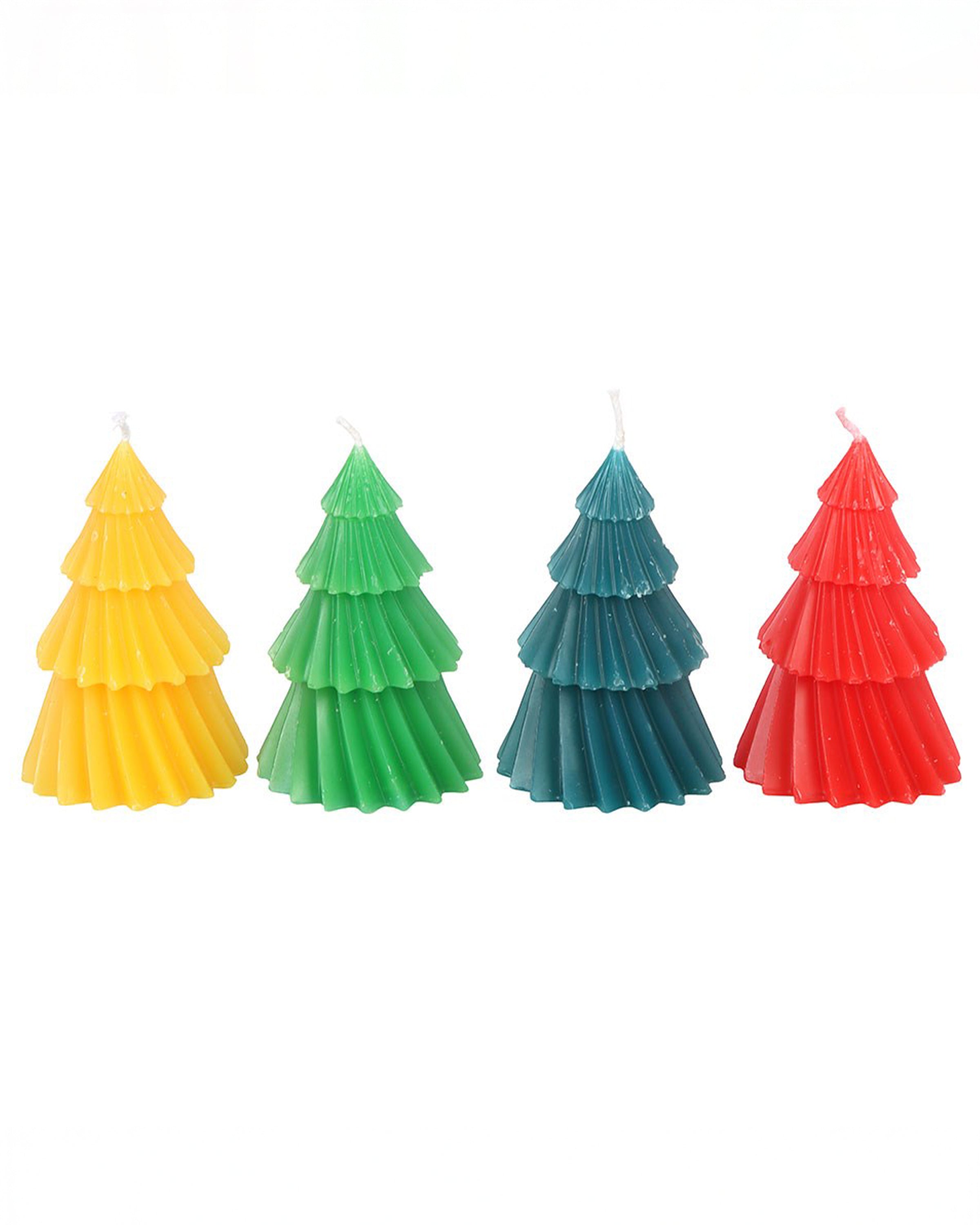 Set of four colourful Christmas tree candles from Rebel Romance, a UK small business celebrating alternative style. Shown in yellow, green, blue and red, these unscented candles add vibrant festive charm to your table or mantelpiece, perfect for millennials who love quirky homeware and bright seasonal décor.
