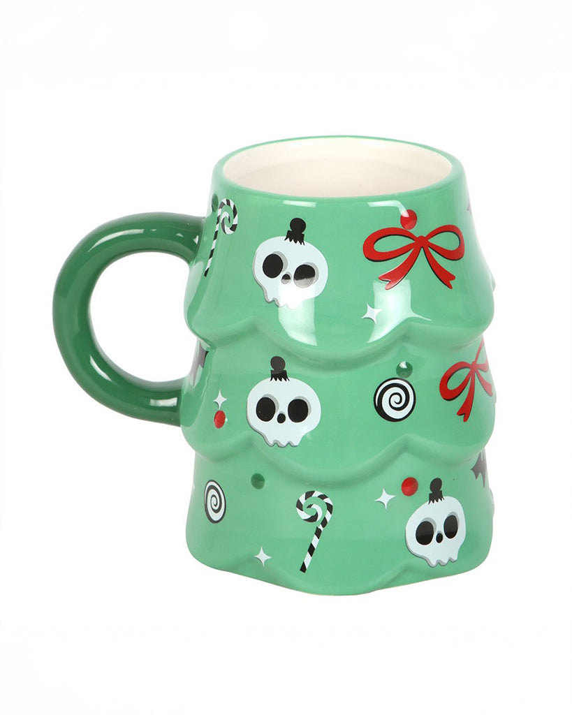 Side view of the Rebel Romance creepy Christmas tree mug with detailed skulls, bows and candy canes across the layered green tree shape. Its playful spooky pattern and bold colours make it a standout gothic festive mug.