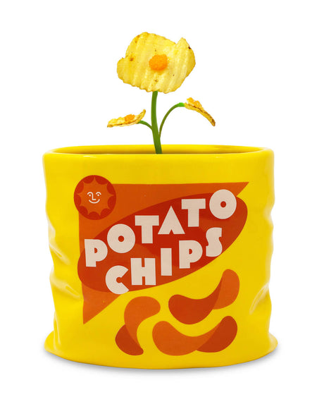 Close-up of the Potato Chips Ceramic Vase with a quirky chip-shaped flower inside, showing off its novelty design and glossy ceramic finish.