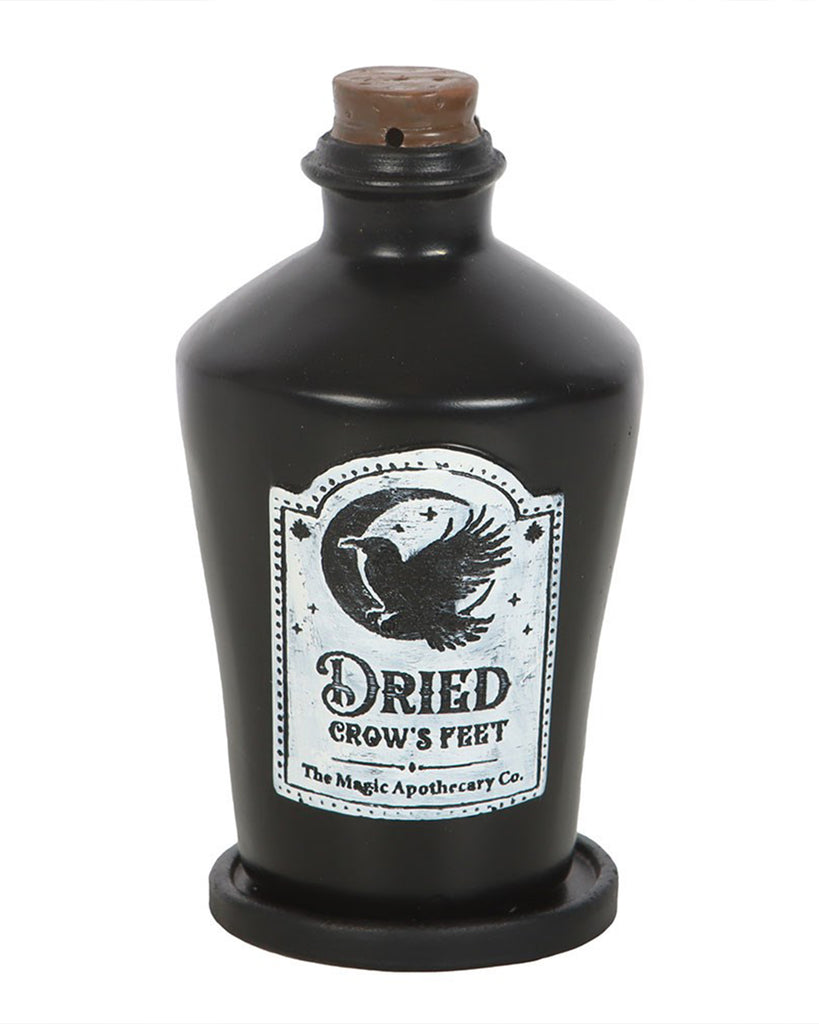 Front view of the Rebel Romance Dried Crow’s Feet incense holder with gothic crow and moon label, made from black resin and styled to look like a magical apothecary bottle.