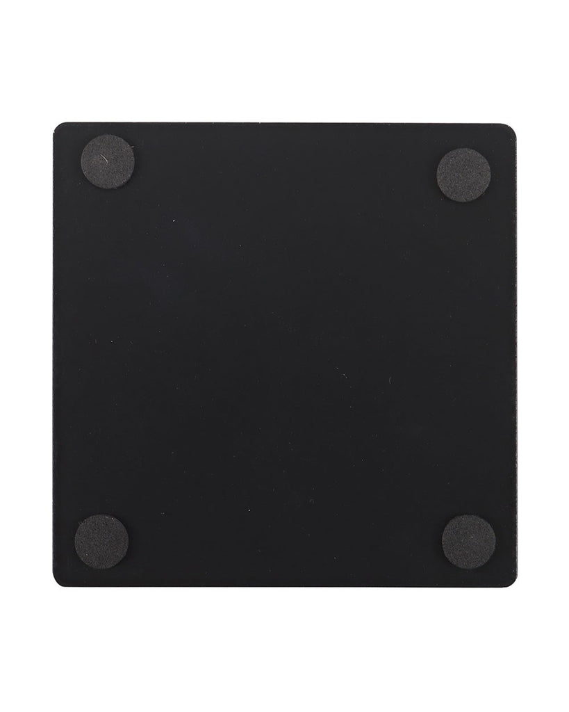 Back of the Caring for Your Demon Cat coaster by Steven Rhodes, showing a black finish with four round non-slip pads. Available at Rebel Romance, a UK alternative fashion and lifestyle store.