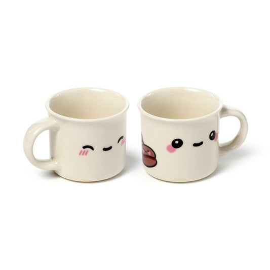 Porcelain espresso cup from Rebel Romance’s Foodiemals range, featuring a closed-eyes happy face with blushing pink cheeks. A cute and playful gift for coffee lovers with a love for kawaii and alternative style.