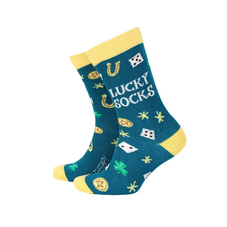 Smiling Faces Lucky Socks in teal with playful good luck motifs including dice, horseshoes, clovers, and gold coins. Made from eco-friendly bamboo with cheerful yellow cuffs and toes, available at Rebel Romance.