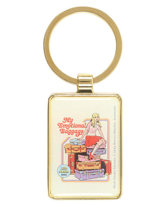 Front view of Rebel Romance’s “My Emotional Baggage” enamel keyring by Steven Rhodes. The gold keyring features retro artwork of a girl on a stack of colourful suitcases, making it a playful and bold accessory for millennials who love unique gifts, humour, and alternative style.