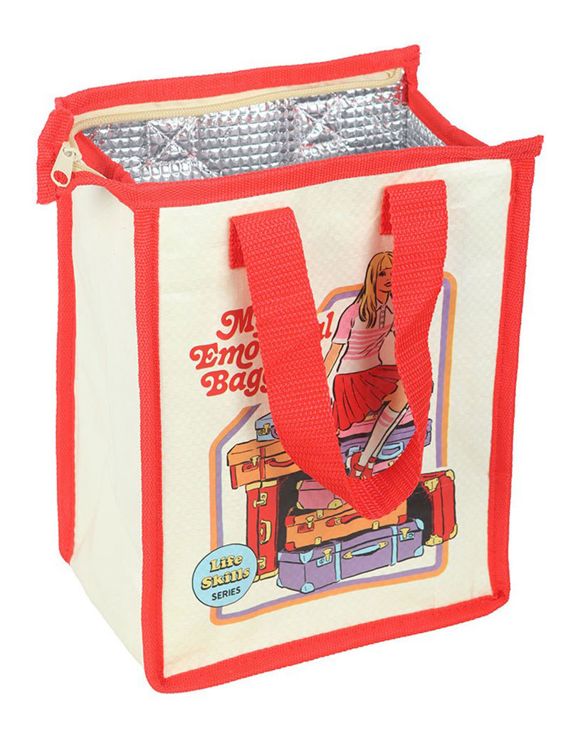 Rebel Romance Steven Rhodes "My Emotional Baggage" insulated lunch bag shown open, revealing a silver thermal lining and zip closure. Cream with red handles and trim, featuring retro illustration of a girl with stacked suitcases. Eco-friendly quirky bag made from recycled plastic.