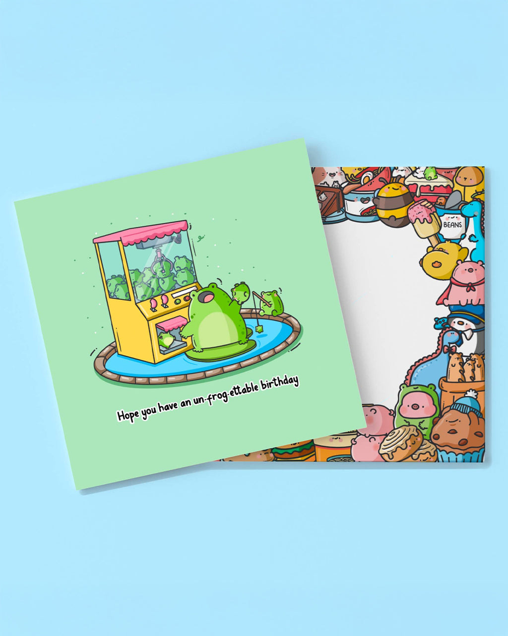 Toastedink’s un-frog-ettable birthday card and envelope featuring a frog-themed claw machine scene. Designed with adorable characters and bright colours. Available at Rebel Romance – the UK’s home for whimsical, alt greeting cards.