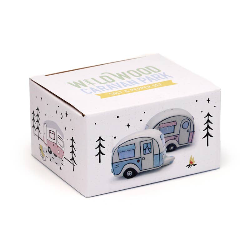 Product packaging for the Home Is Where You Park It Caravan Salt & Pepper Set by Rebel Romance. The box features both pastel pink and blue ceramic caravans, with whimsical illustrations and trees, capturing cosy camping vibes.