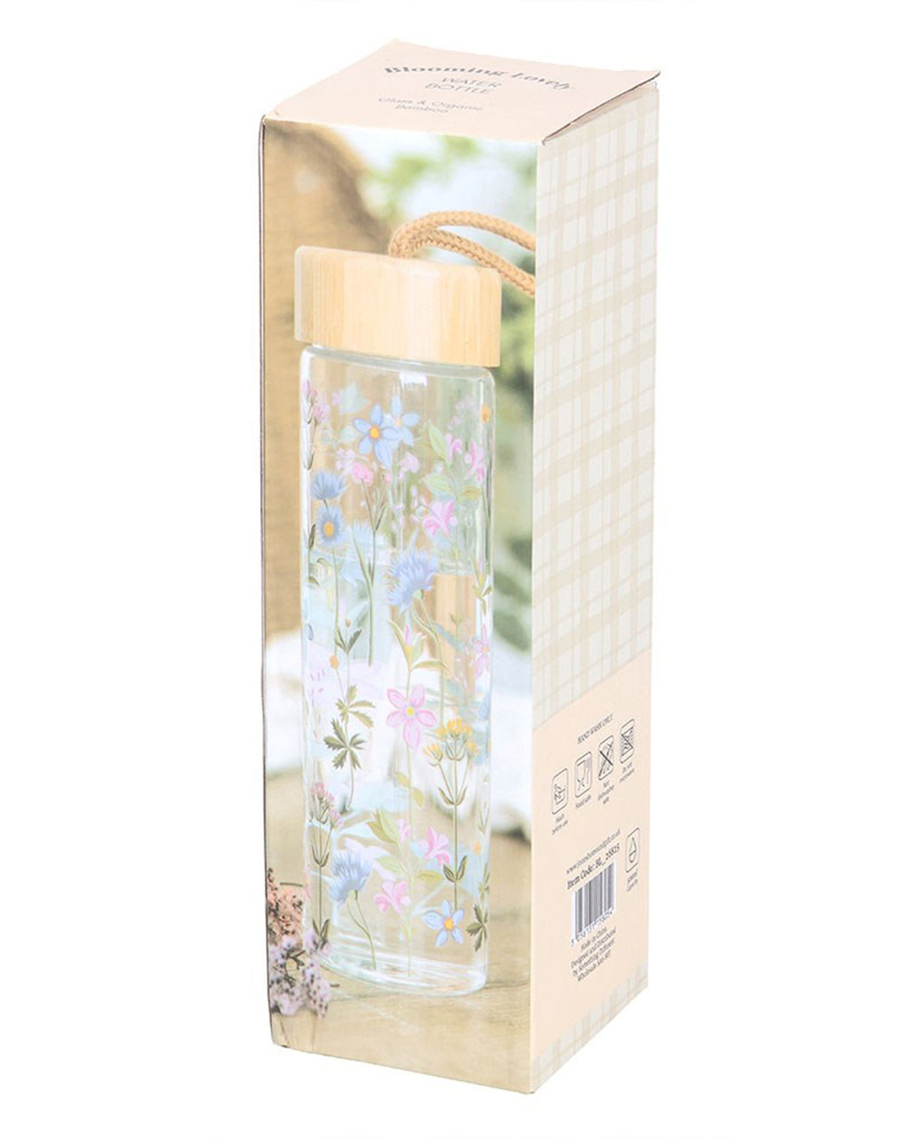Floral Print Glass Water Bottle by Rebel Romance, a small UK business celebrating alternative aesthetics. The clear glass bottle features a delicate pastel floral design in pink, blue, yellow, and green. Comes with a bamboo lid and rope handle. Packaged in a stylish box, making it perfect for gifting.