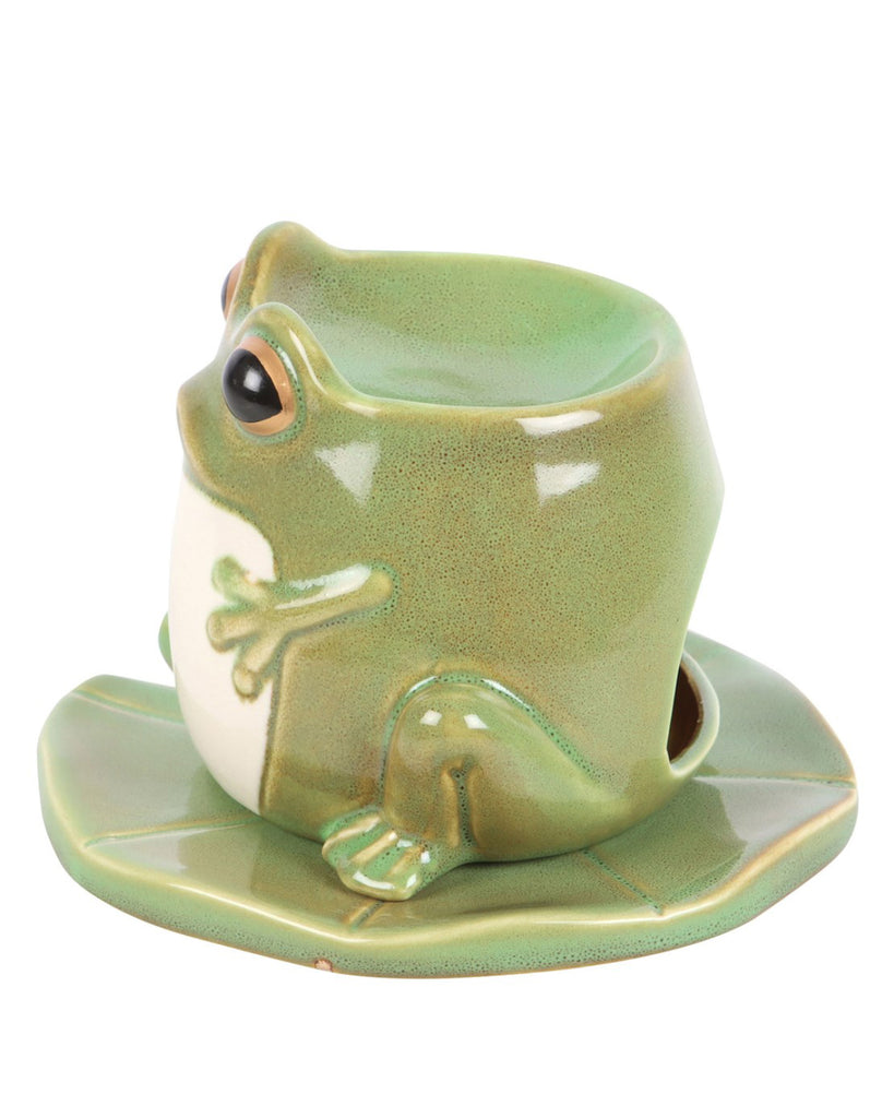 Side angle of the frog-shaped burner, showing its curved design and opening for the tealight.