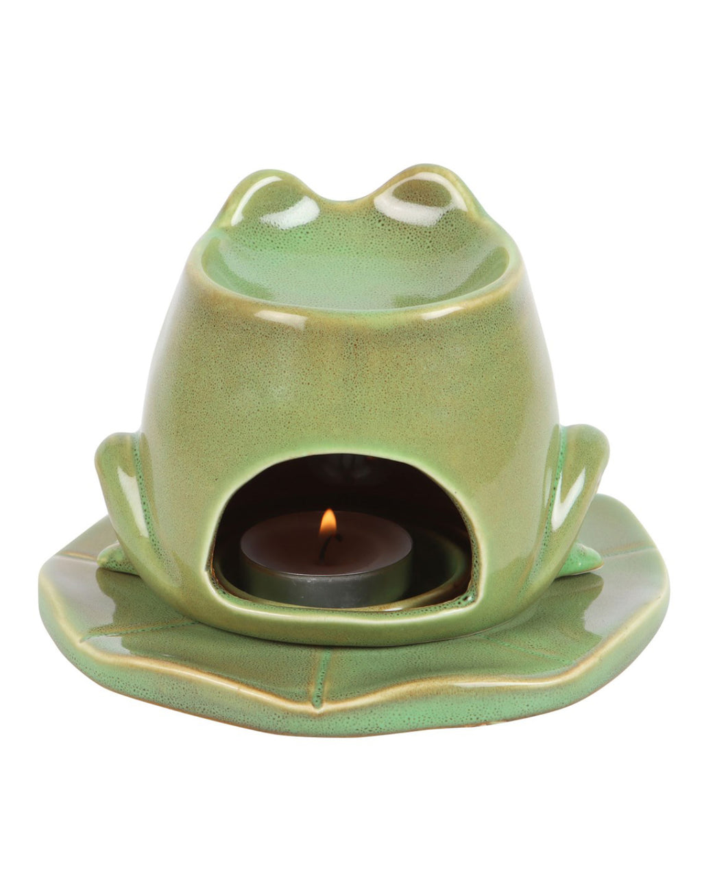 Back view of the frog burner with a lit tealight inside, glowing through the open cavity.