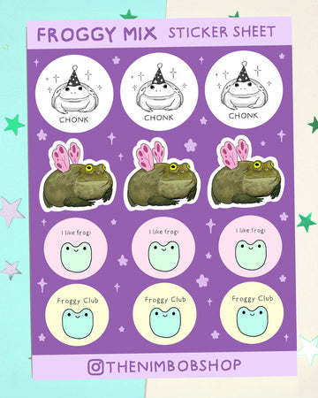 Froggy Mix Sticker Sheet by Nimbob, sold by Rebel Romance. A purple and pastel sticker sheet featuring 12 hand-drawn frog designs including party hat “CHONK” frogs, fairy wing frogs, and round smiling frog faces with text like “I like frogi” and “Froggy Club”. A whimsical collection perfect for decorating sketchbooks and laptops. Ideal for millennials into alternative style, cottagecore and dopamine dressing.