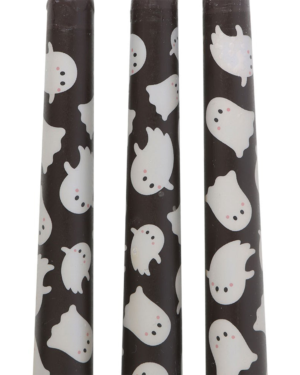 Close-up of three black taper candles with a playful white ghost pattern, designed by Rebel Romance. Each ghost has a cute expression and rosy cheeks, making these candles perfect for spooky Halloween décor or alternative gothic aesthetics. Great for themed tablescapes or gifting.