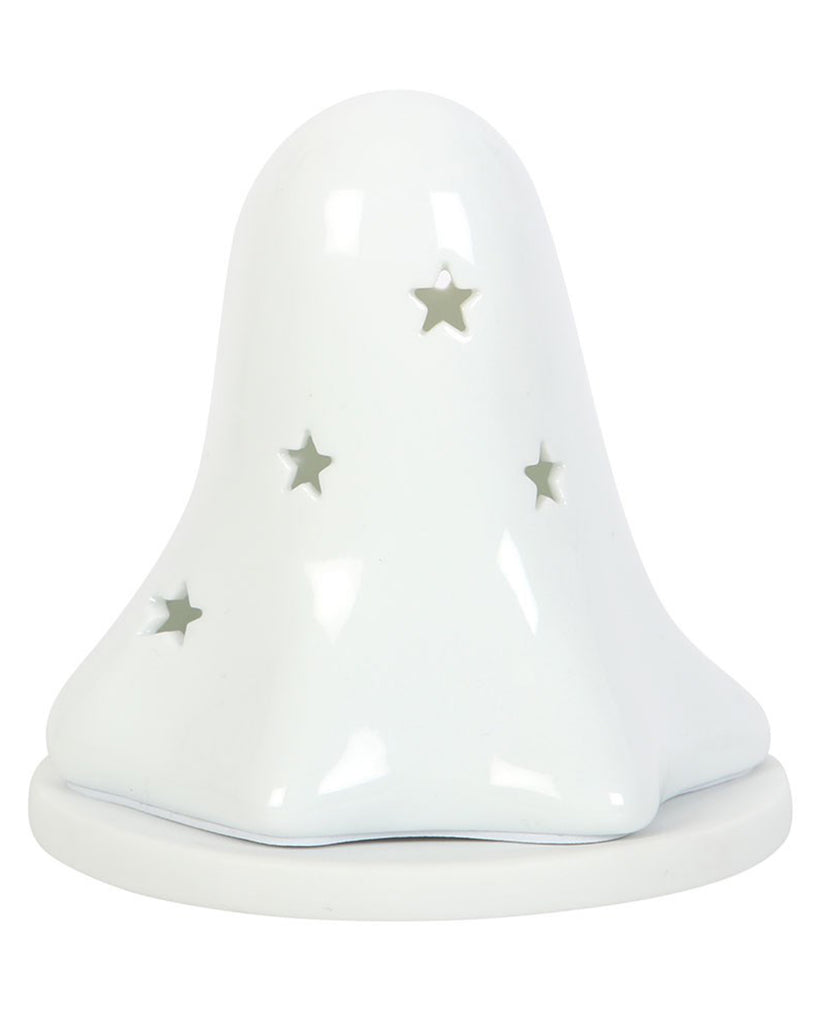 A white ceramic ghost tealight holder by Rebel Romance UK, featuring star-shaped cut-outs designed to emit a soft, spooky glow. Perfect for Halloween home décor or year-round gothic vibes, this alternative style ornament adds a whimsical charm to any room.
