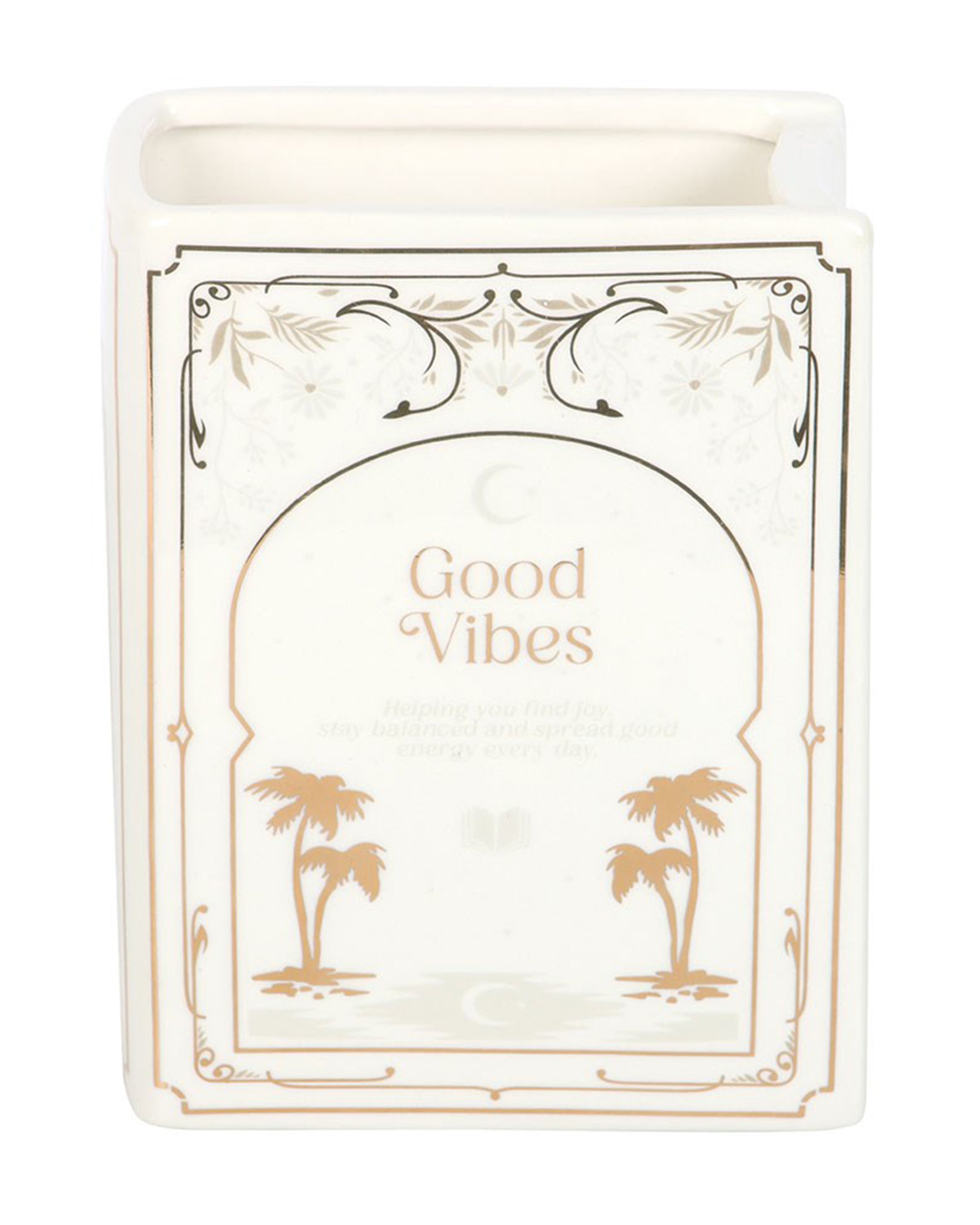 Close-up of Rebel Romance Good Vibes White Book Shaped Vase. This white ceramic vase with gold detailing and palm tree illustration is shaped like a standing book, bringing a literary flourish to home décor. Perfect for holding flowers or as a stylish statement piece.