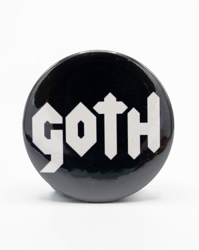 Black button badge with 'Goth' written in the centre in a white gothic style font. A retro inspired design by Bite Your Granny.