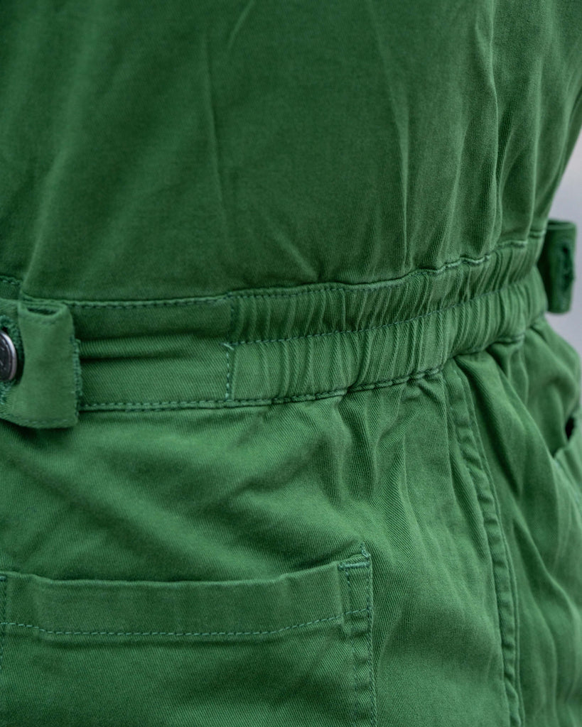 Close-up of elasticated waistband on the Forest Green Boiler Suit, showing premium stitching and adjustable side tab.