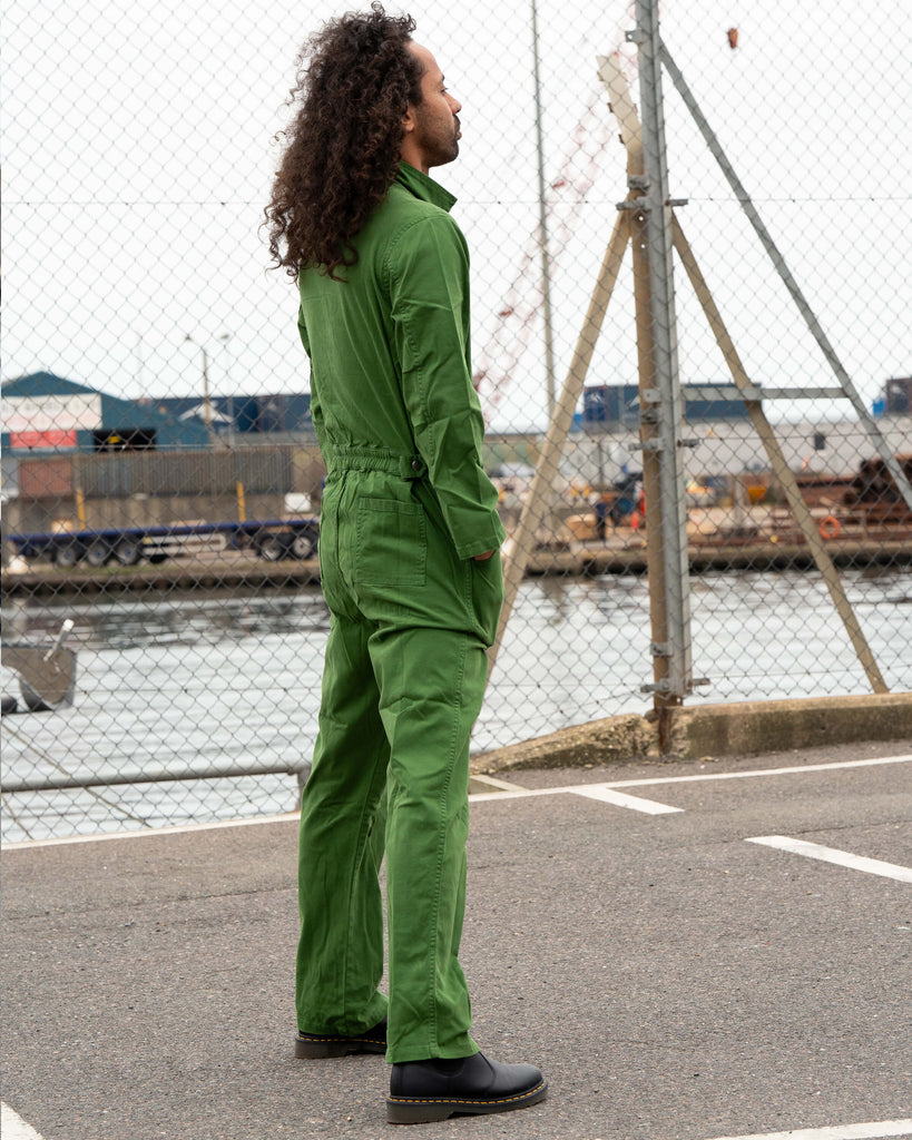 Side view of Richard wearing the Forest Green Boiler Suit, showing the flattering tailored shape and utility pockets.