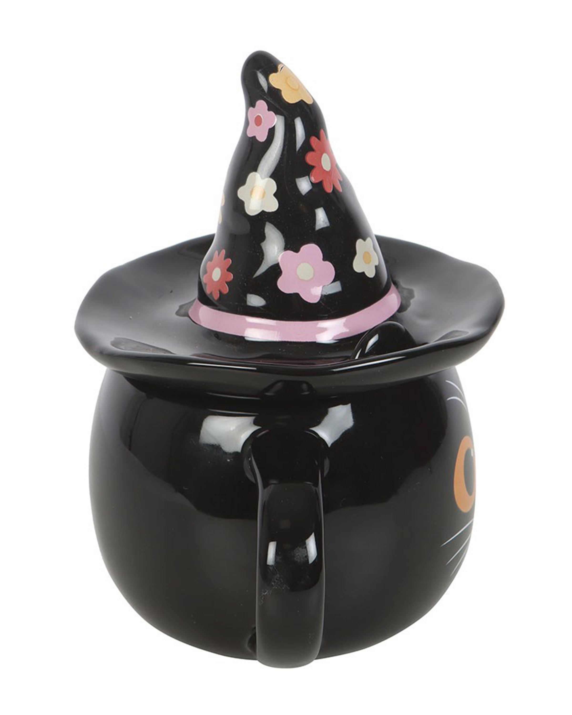 Side view of the Groovy Witch Cat Lidded Mug by Rebel Romance, showing its floral witch hat lid and curved black handle. The cat’s orange eyes and whiskers peek out from the front, making it a perfect spooky-season home accessory.