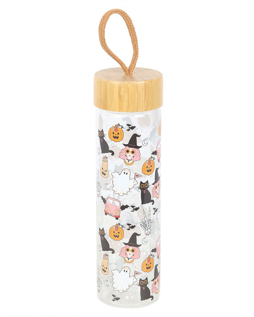 Groovy Ghost Print Glass Water Bottle by Rebel Romance with bamboo lid and rope loop displayed. Decorated in cute Halloween motifs including smiling jack-o'-lanterns, pink witches, bats and ghosts. Ideal for quirky everyday style and spooky hydration.