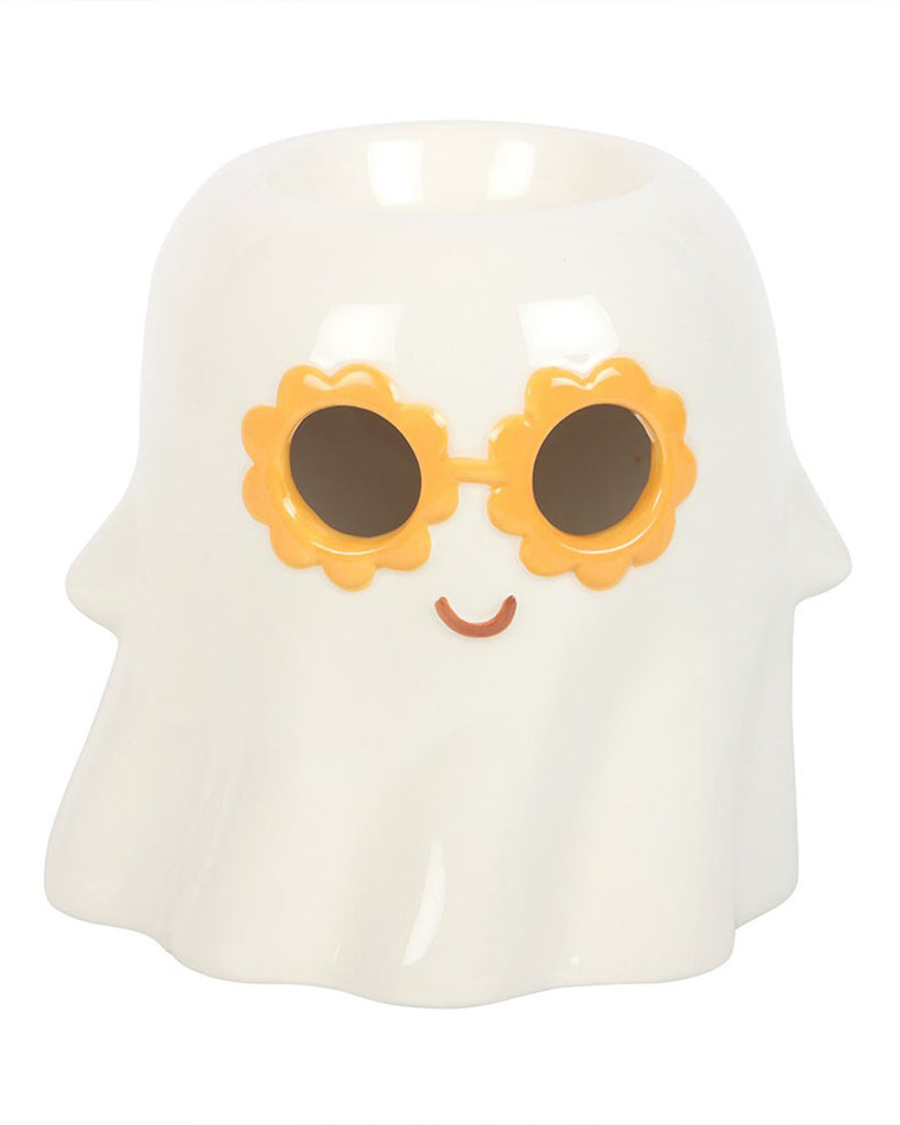 Front-facing Groovy Ghost oil burner with bright orange flower sunglasses and a cute smile, made from glossy white ceramic. A fun wax melt burner for Halloween or year-round spooky vibes from Rebel Romance.
