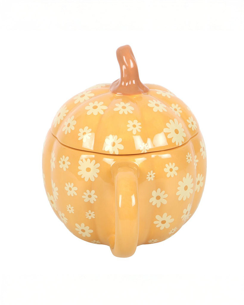 Rear view of the Groovy Floral Pumpkin Mug from Rebel Romance, showcasing the curved handle and pumpkin-inspired daisy design. This cheerful ceramic mug adds a vintage twist to autumn homeware and drinkware collections.