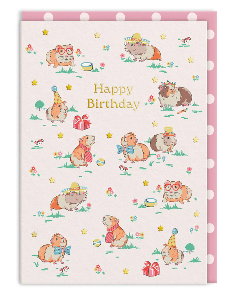 A6 birthday card featuring cute illustrated guinea pigs wearing party hats, glasses, and bow ties, surrounded by flowers and birthday decorations. Designed by Cath Kidston and stocked by Rebel Romance, this card features gold foil details and comes with a pink spotty envelope. A perfect birthday card for guinea pig lovers, animal fans, and anyone who loves charming and cheerful designs.