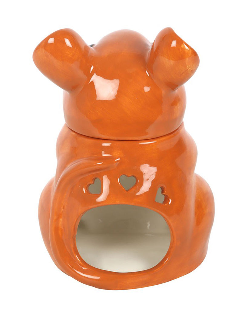 Rear view of the ceramic mouse oil burner, featuring heart-shaped cut-outs and an opening for a tealight.