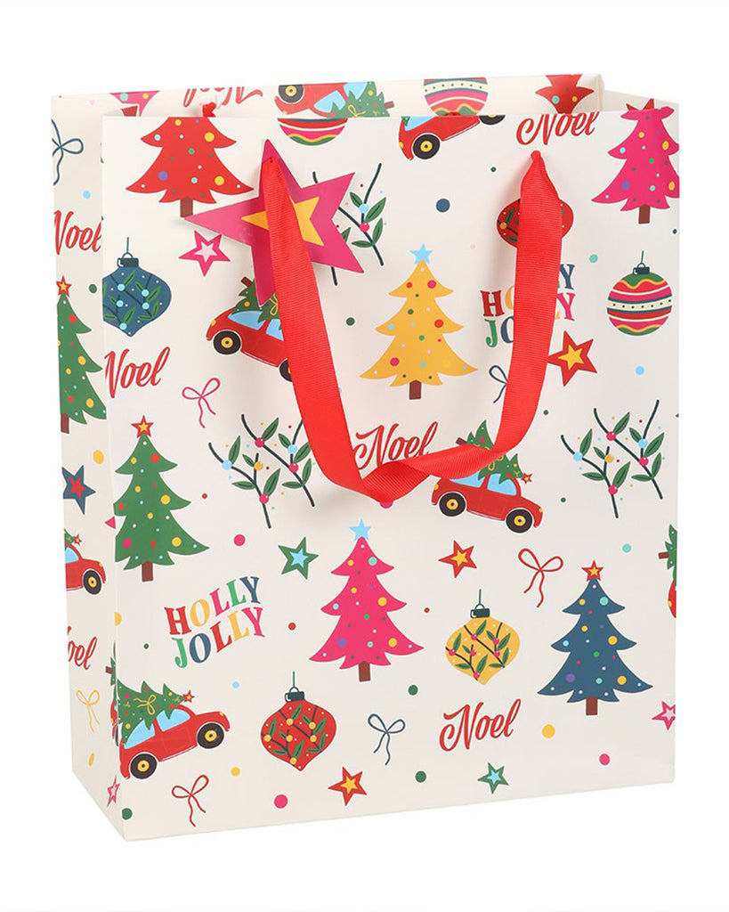 Front view of the 23cm Rebel Romance Nostalgic Christmas Print Gift Bag with bright red ribbon handles and retro festive graphics, including cars with trees, colourful baubles, and the words “Holly Jolly” and “Noel” for cheerful gifting.