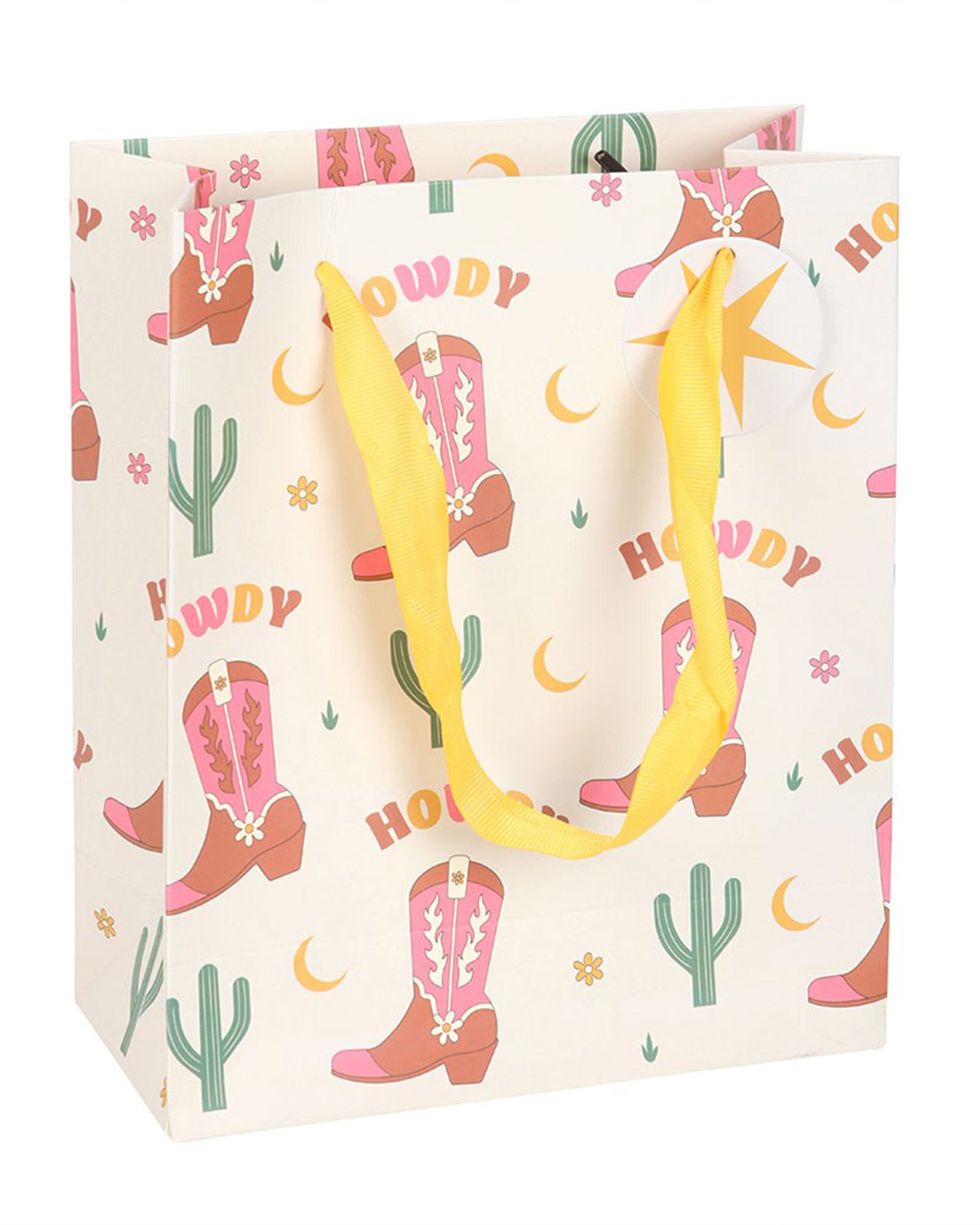 Rebel Romance medium gift bag featuring pink Western boots, cacti and moons, with bright yellow ribbon handles and a matching star gift tag for celebrations.