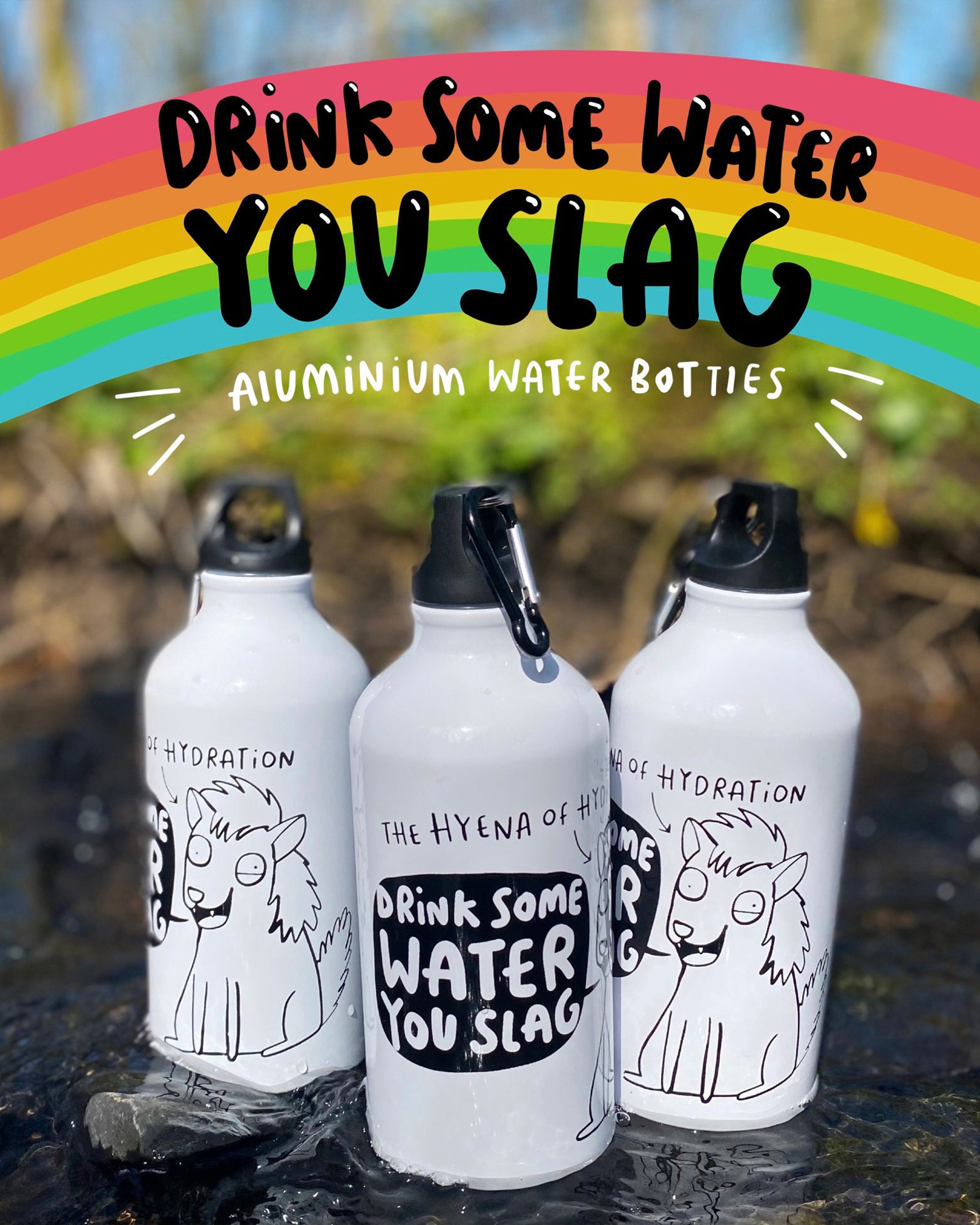 Three “Hyena of Hydration” aluminium water bottles from Rebel Romance in a stream, with bold rainbow text overlaid that reads “Drink Some Water You Slag – Aluminium Water Botties.”