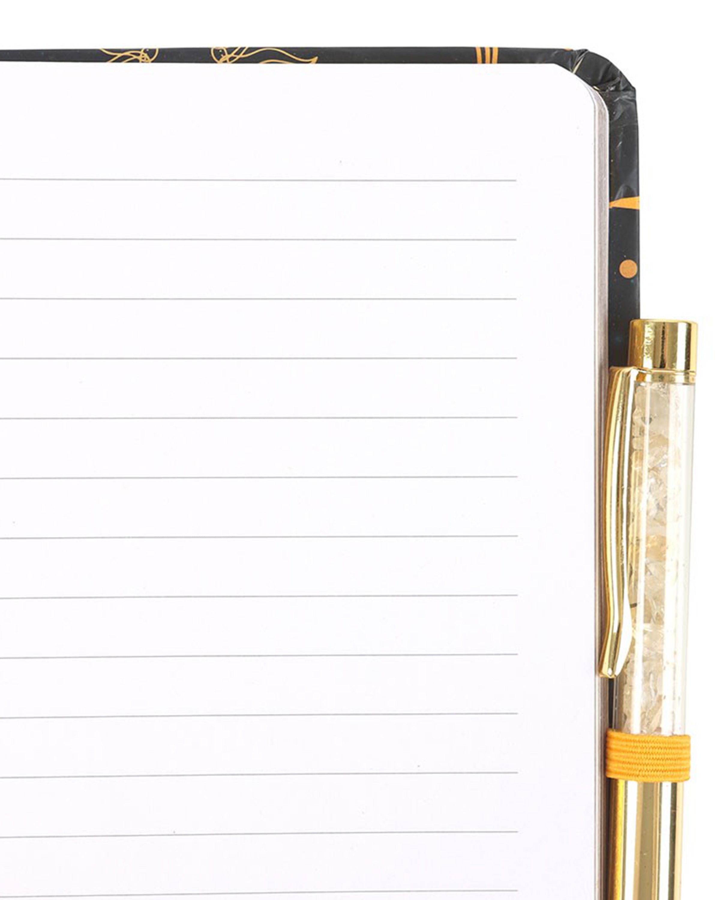 Notebook with a gold pen on a white background