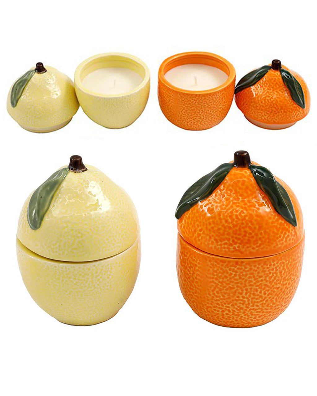 A set of two cute fruit-shaped candles from Rebel Romance, featuring one lemon-shaped candle in soft pastel yellow with a glossy green leaf and one orange-shaped candle in vibrant orange with realistic textured detailing. Shown both with lids on and off, revealing a smooth white wax interior.
