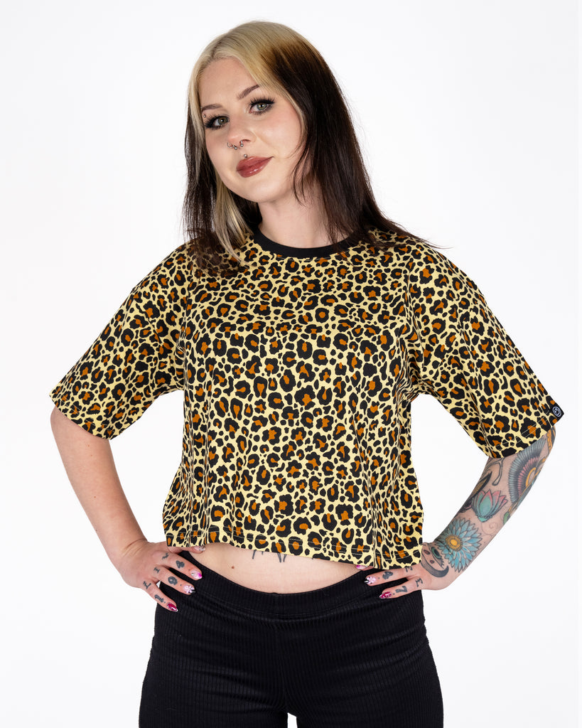 Florence wears the Rebel Romance Classic Leopard Cropped Boxy Tee, styled with attitude and confidence. This soft stretch cotton tee is designed for bold fashion lovers by UK alt brand Rebel Romance.