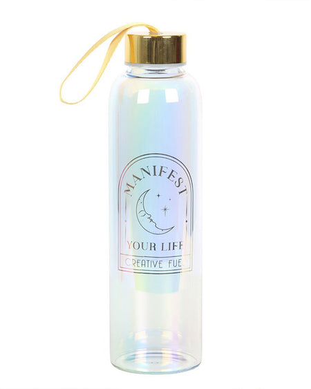 Close-up of the Rebel Romance Manifest Your Life iridescent glass water bottle, highlighting the gold-printed moon and stars design with motivational text. The gold lid and carry strap add a stylish, practical touch.