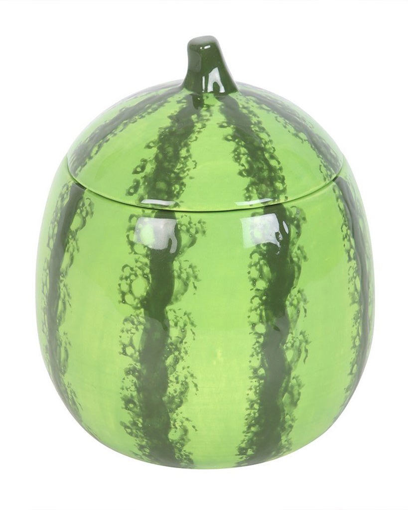 A front-facing view of the watermelon candle jar with the lid on. The jar’s smooth, glossy finish mimics the look of a fresh watermelon.