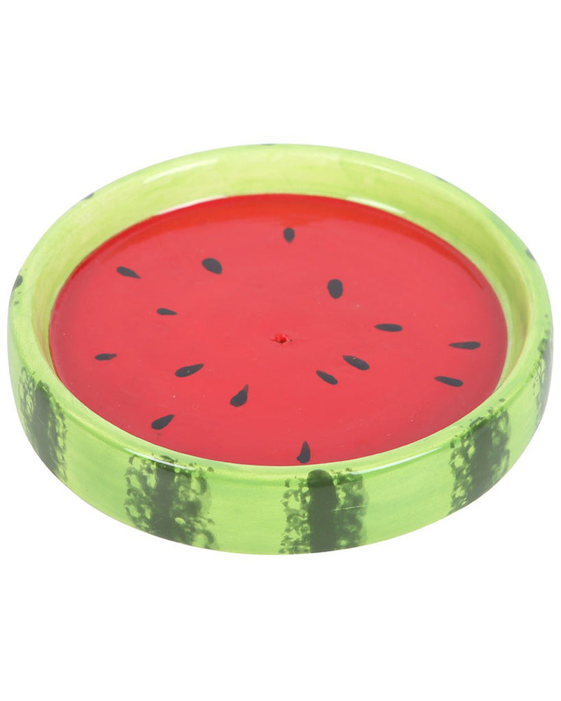 A round ceramic watermelon incense holder with a red surface and black seed details, encased in a green rind with a realistic texture. A perfect fruity decor piece for catching incense ash.