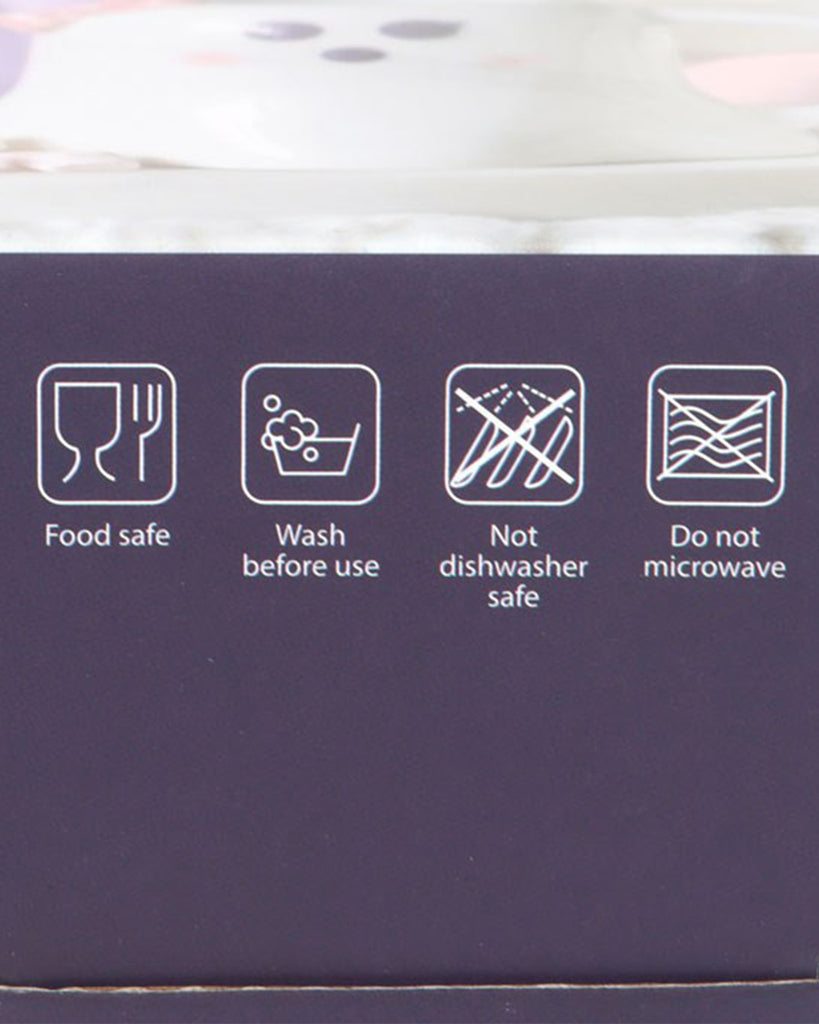 A close-up of the packaging showing icons that indicate the mug is food safe, should be washed before use, is not dishwasher safe, and should not be microwaved.